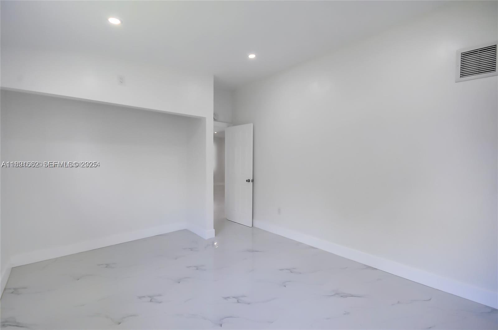 14465 Southwest 290th Terrace Homestead, FL 33033 - Photo 22 of 31 a view of an empty room