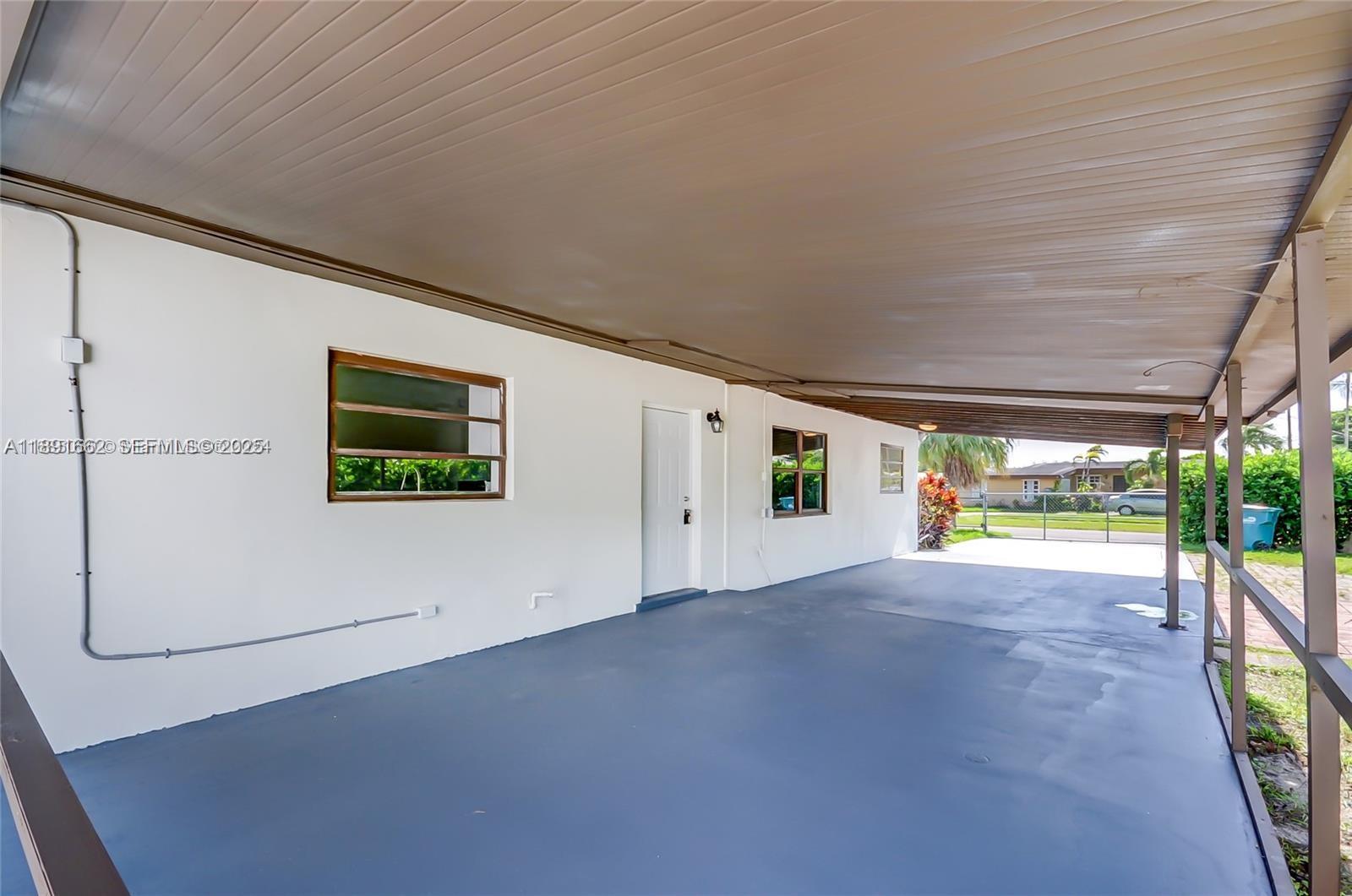 14465 Southwest 290th Terrace Homestead, FL 33033 - Photo 31 of 31 an empty room with windows