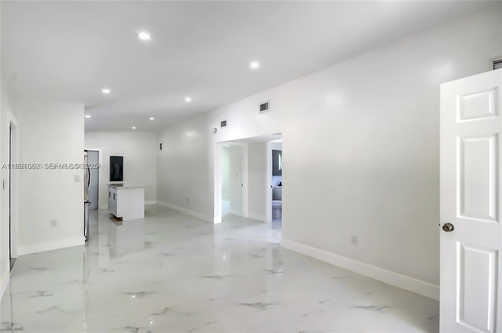 14465 Southwest 290th Terrace Homestead, FL 33033 - Photo 5 of 31 a view of an empty room