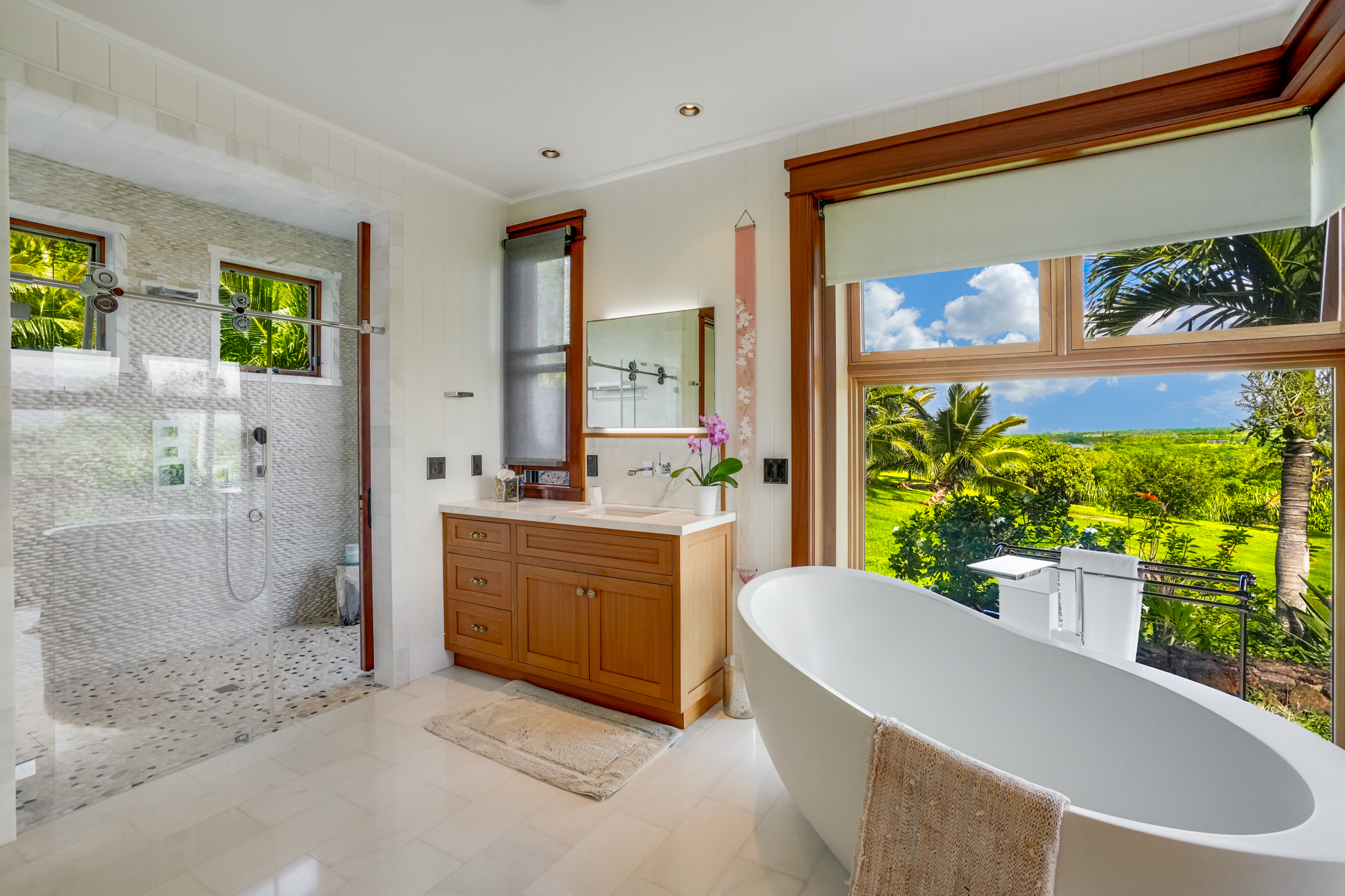 2332 Makana Ano Place Kilauea, HI 96754 - Photo 13 of 30 a large white tub sitting in a bathroom next to a window