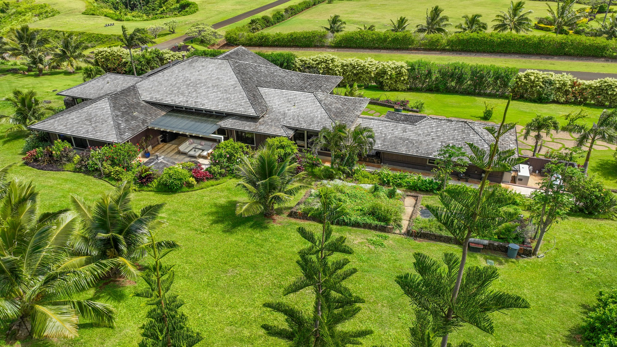 2332 Makana Ano Place Kilauea, HI 96754 - Photo 26 of 30 an aerial view of a house with a garden and yard