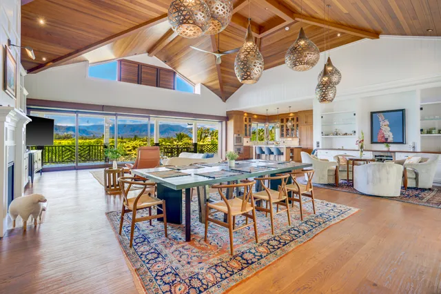 a dinning table and chairs in a patio