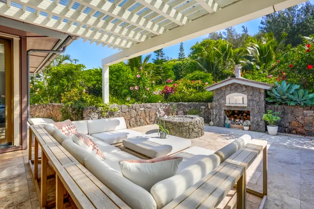 a outdoor living space with furniture and garden view