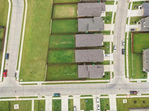 a view of a house with a big yard