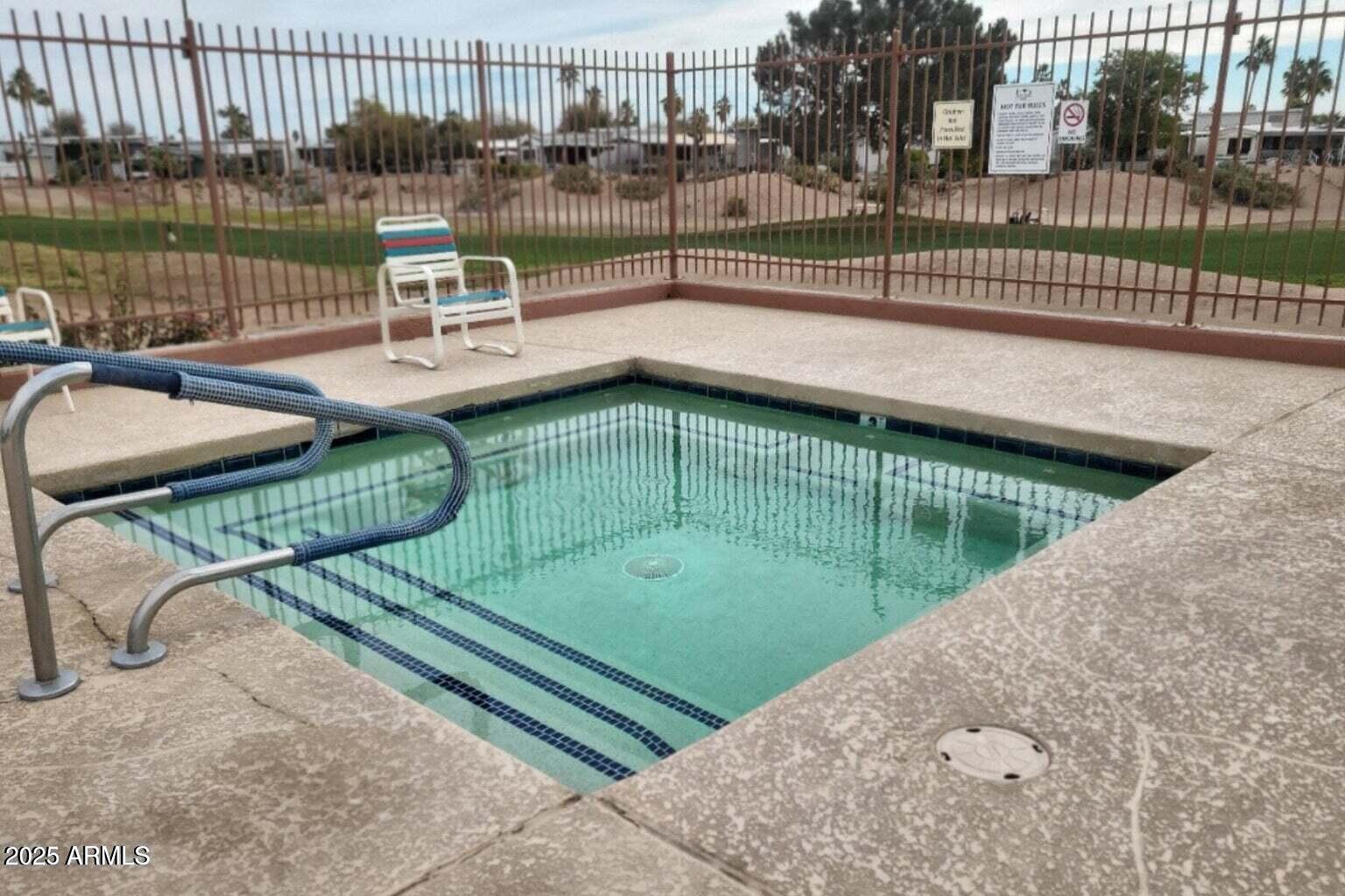 17200 West Bell Road, Unit 712 Surprise, AZ 85374 - Photo 12 of 19 a view of a patio with a yard