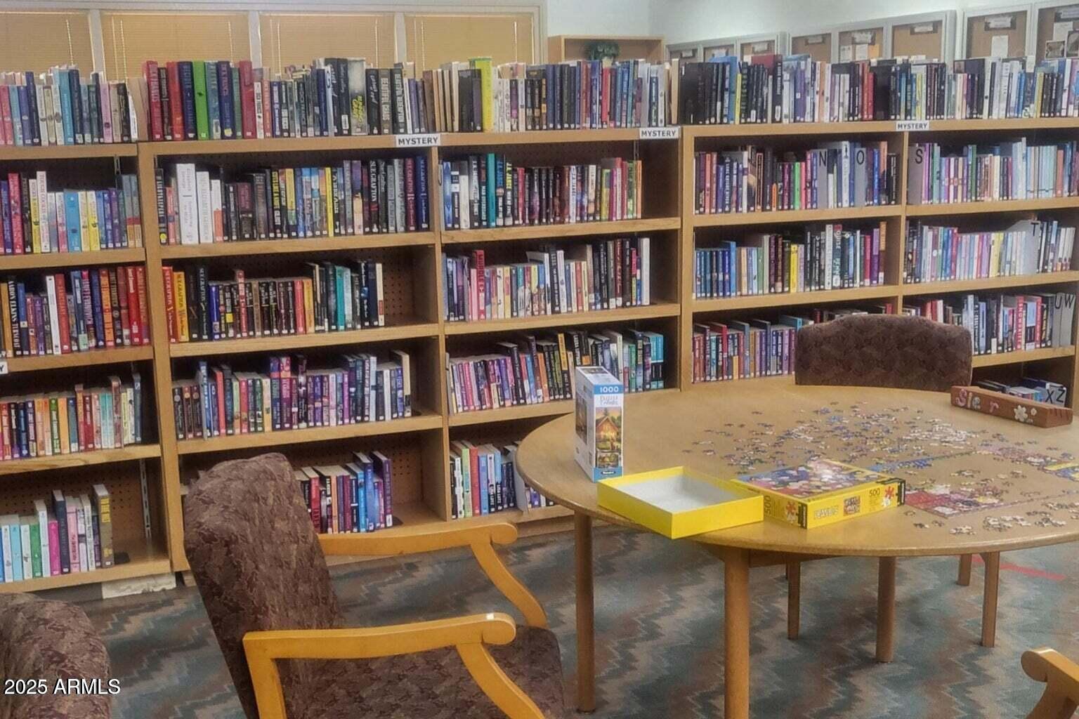17200 West Bell Road, Unit 712 Surprise, AZ 85374 - Photo 14 of 19 a view of a workspace with bookshelf