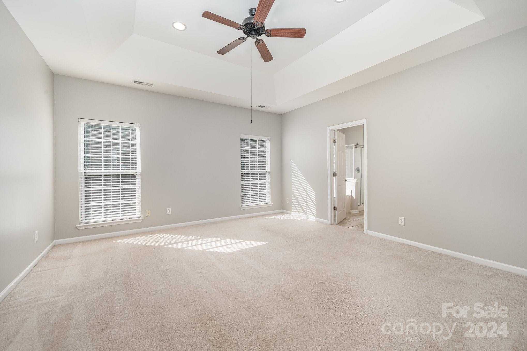 13341 Meadowmere Road Huntersville, NC 28078 - Photo 10 of 22 a view of an empty room with a window