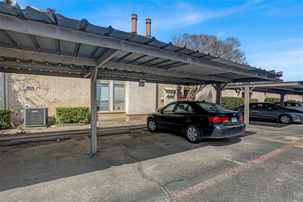 12834 Midway Road, Unit 2110 Dallas, TX 75244 - Photo 18 of 22 View of covered parking lot