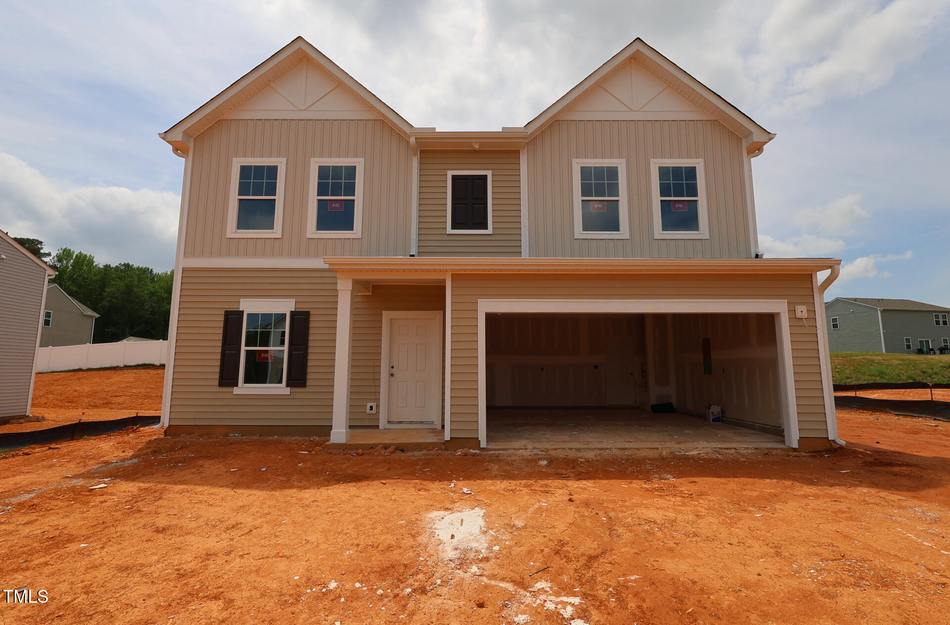 944 Bombardier Ln Spring Spring Hope, NC 27882 - Photo 3 of 42 a front view of a house with a yard