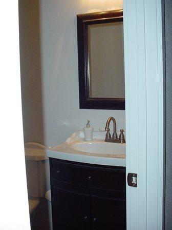 12603 Nelson Road Yakima, WA 98903 - Photo 13 of 22 a bathroom with a sink and a mirror