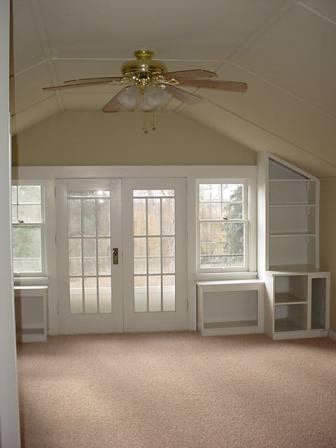 12603 Nelson Road Yakima, WA 98903 - Photo 15 of 22 an empty room with chandelier fan and windows