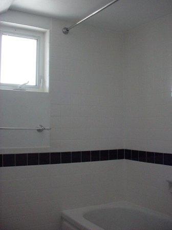 12603 Nelson Road Yakima, WA 98903 - Photo 17 of 22 a bathroom with a bathtub and white shower