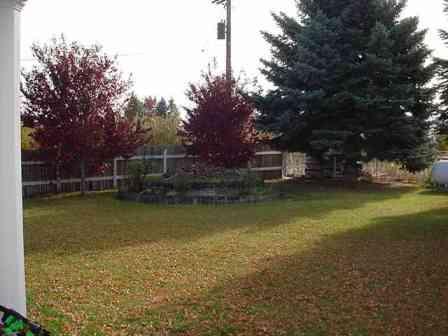 12603 Nelson Road Yakima, WA 98903 - Photo 18 of 22 a view of a swimming pool with a yard