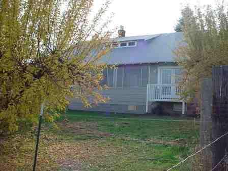 12603 Nelson Road Yakima, WA 98903 - Photo 20 of 22 a view of a house with a yard