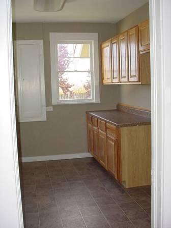12603 Nelson Road Yakima, WA 98903 - Photo 3 of 22 a room with a sink window and cabinets