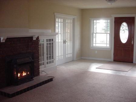 12603 Nelson Road Yakima, WA 98903 - Photo 7 of 22 a living room with furniture and a fireplace