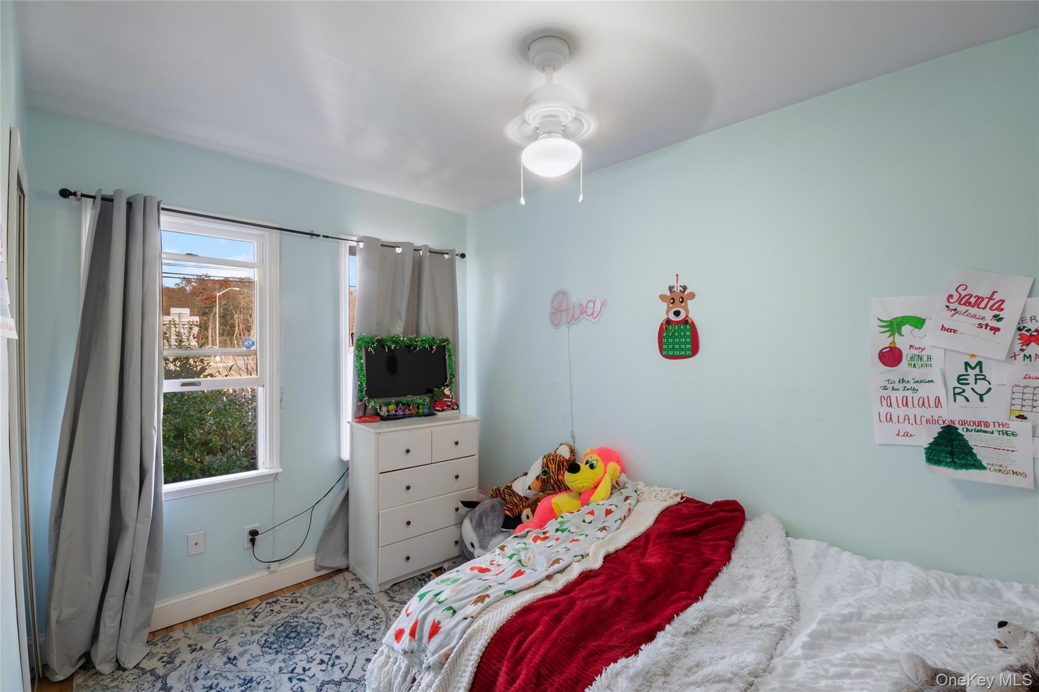 277 Horseblock Road Farmingville, NY 11738 - Photo 14 of 28 Bedroom with ceiling fan and baseboards