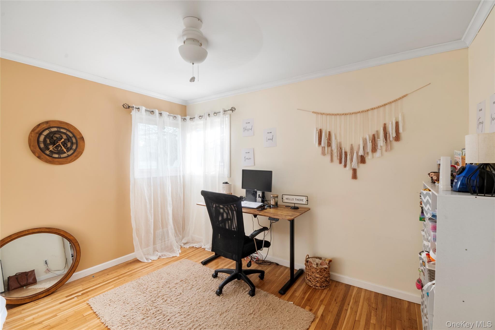 277 Horseblock Road Farmingville, NY 11738 - Photo 15 of 28 Office space featuring crown molding, light wood-type flooring, and ceiling fan