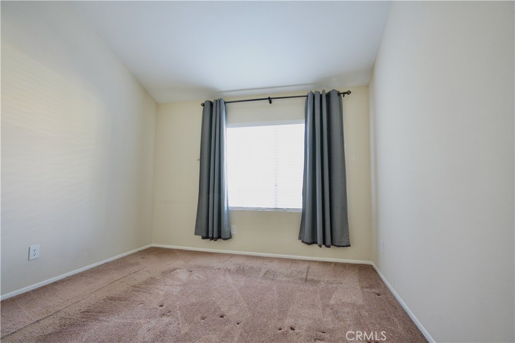 407 Tangelo Irvine, CA 92618 - Photo 22 of 30 an empty room with kitchen view and closet