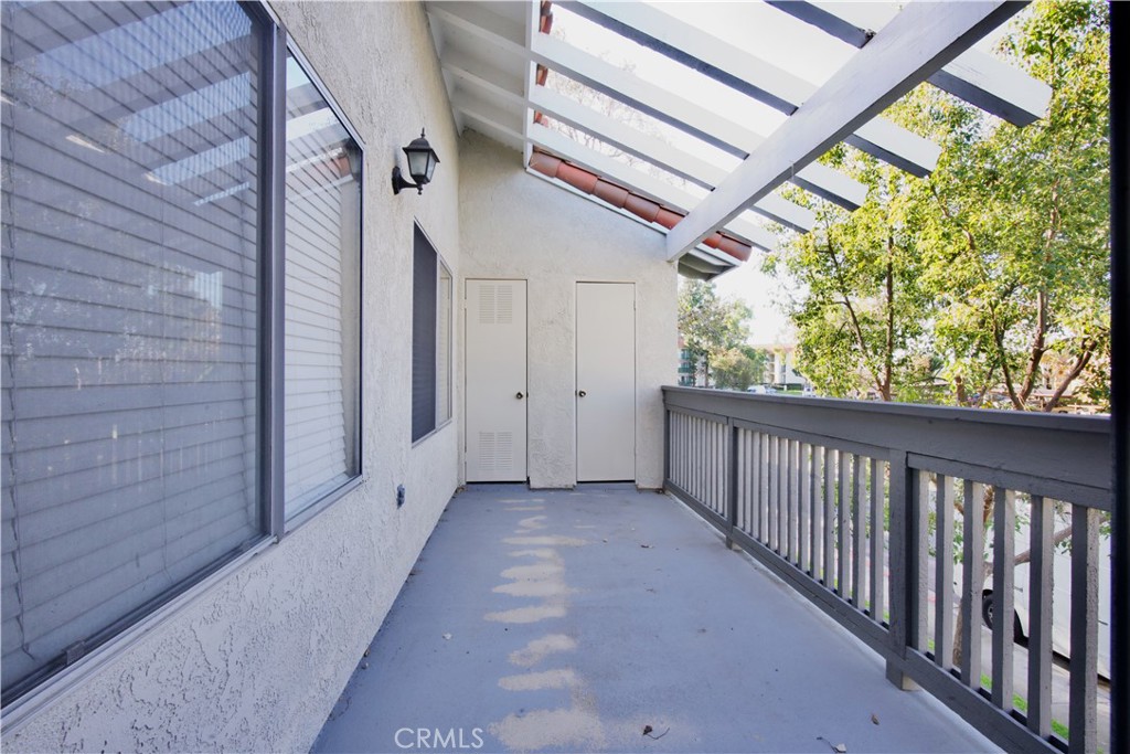 407 Tangelo Irvine, CA 92618 - Photo 25 of 30 a view of hallway with wooden stairs