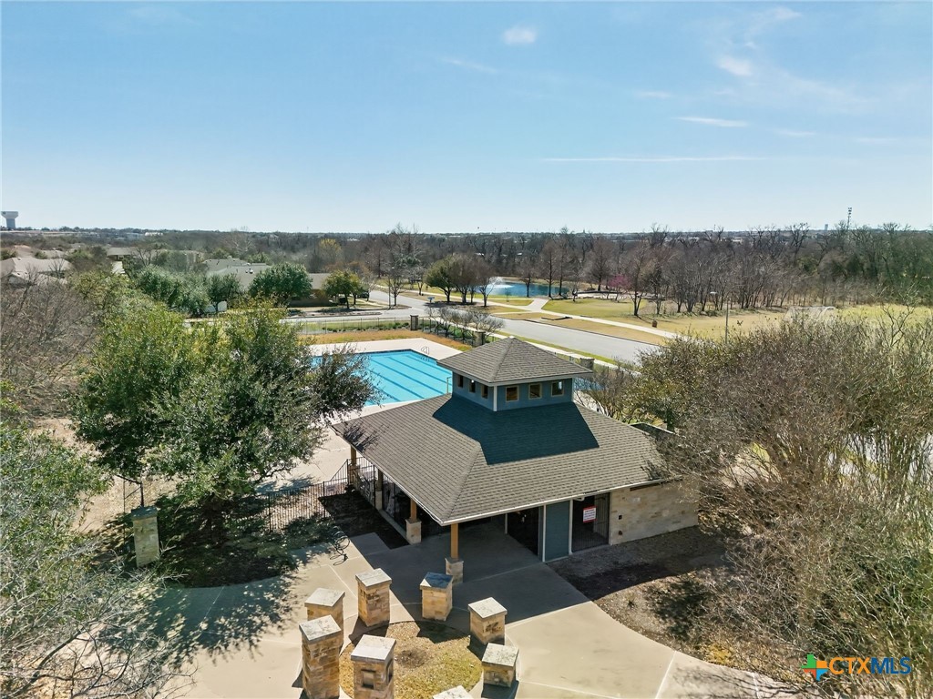 201 Cane River Road Pflugerville, TX 78660 - Photo 5 of 21 a view of a swimming pool and lake view