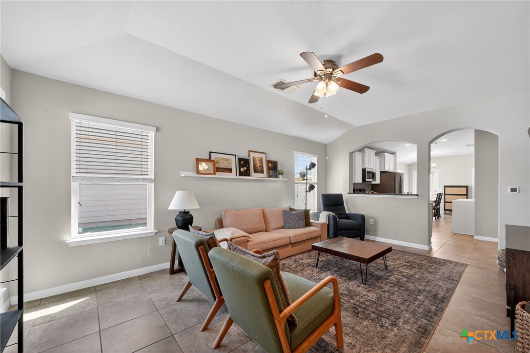 201 Cane River Road Pflugerville, TX 78660 - Photo 8 of 21 a living room with furniture and window