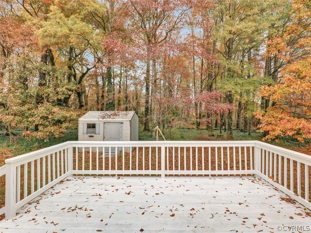 1570 Graves Road Sandston, VA 23150 - Photo 23 of 26 Deck Over Looks Private Rear Wooded Area