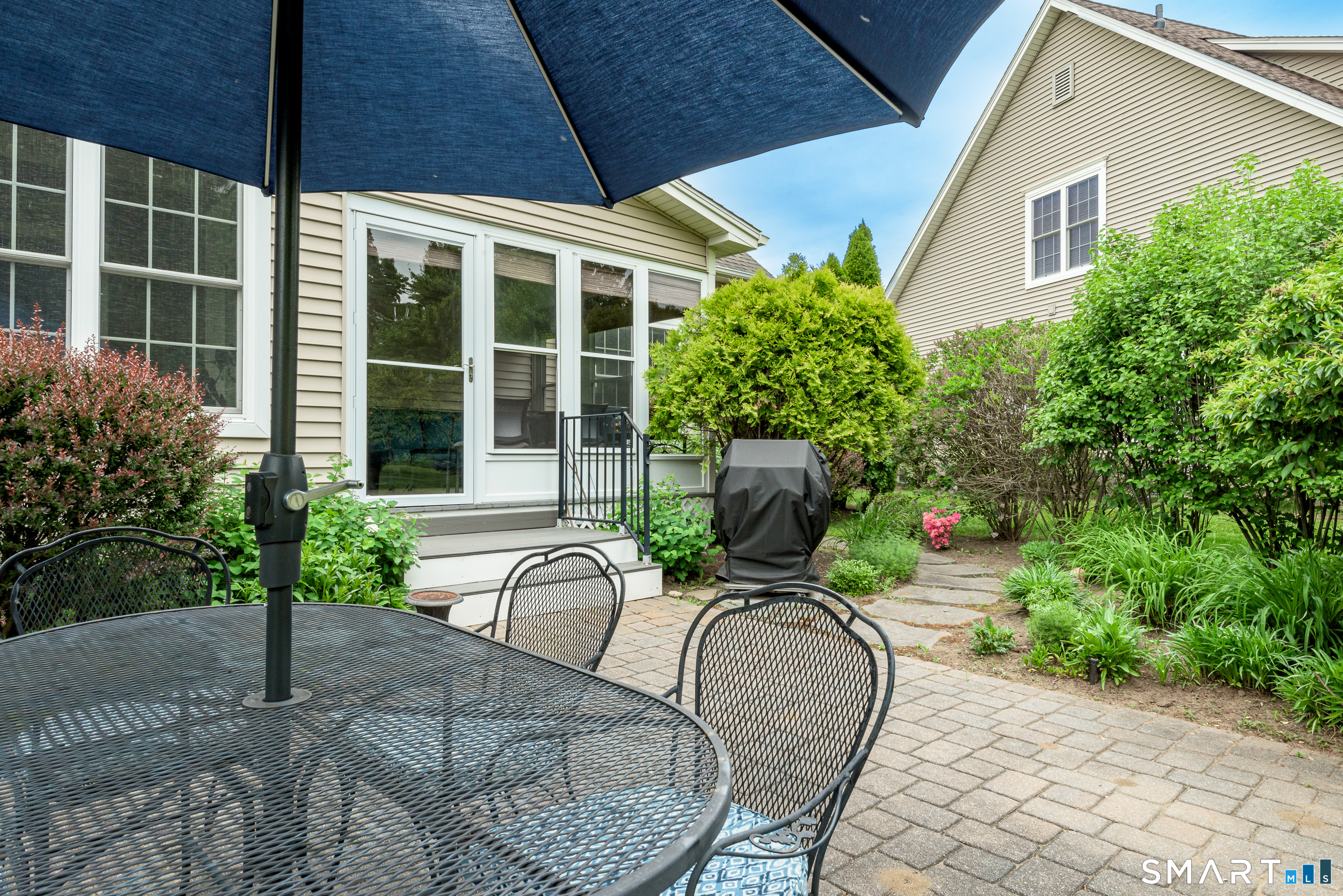 8 Greendale Drive, Unit 8 Suffield, CT 06078 - Photo 16 of 40 a house view with a seating space
