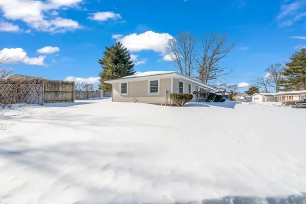 a view of a house with a snow