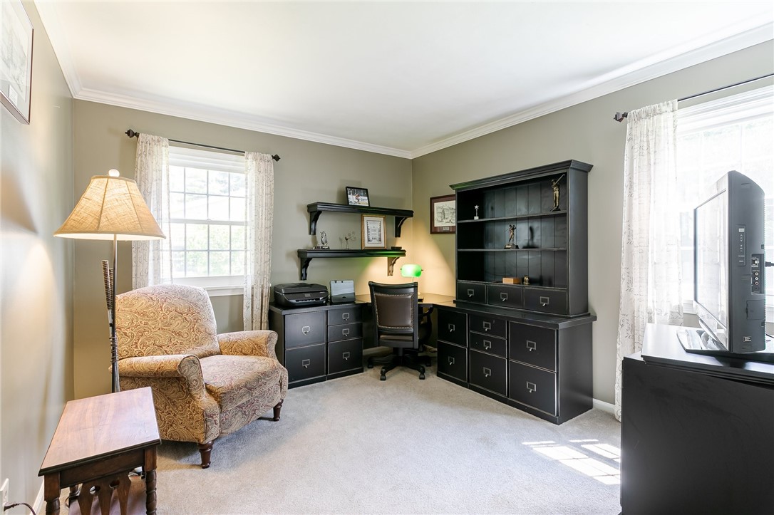 2024 Baird Road Penfield, NY 14526 - Photo 14 of 37 4th bedroom (located on 1st floor) is being used a