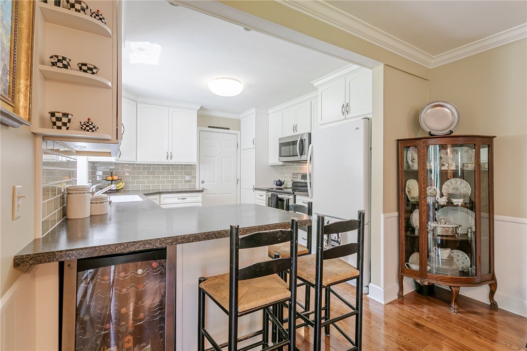 2024 Baird Road Penfield, NY 14526 - Photo 19 of 37 Another view of wine cooler.