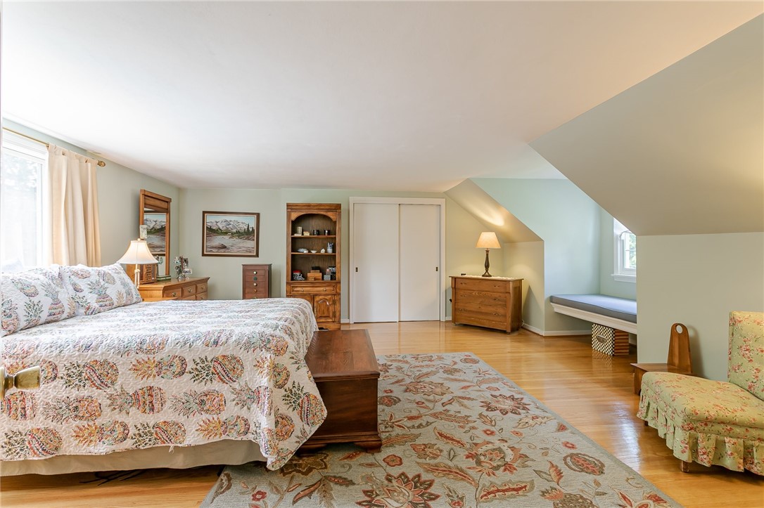 2024 Baird Road Penfield, NY 14526 - Photo 2 of 37 Natural light floods this large, upstairs bedroom