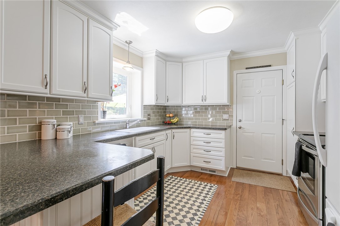 2024 Baird Road Penfield, NY 14526 - Photo 21 of 37 Lots of counterspace and cabinets!