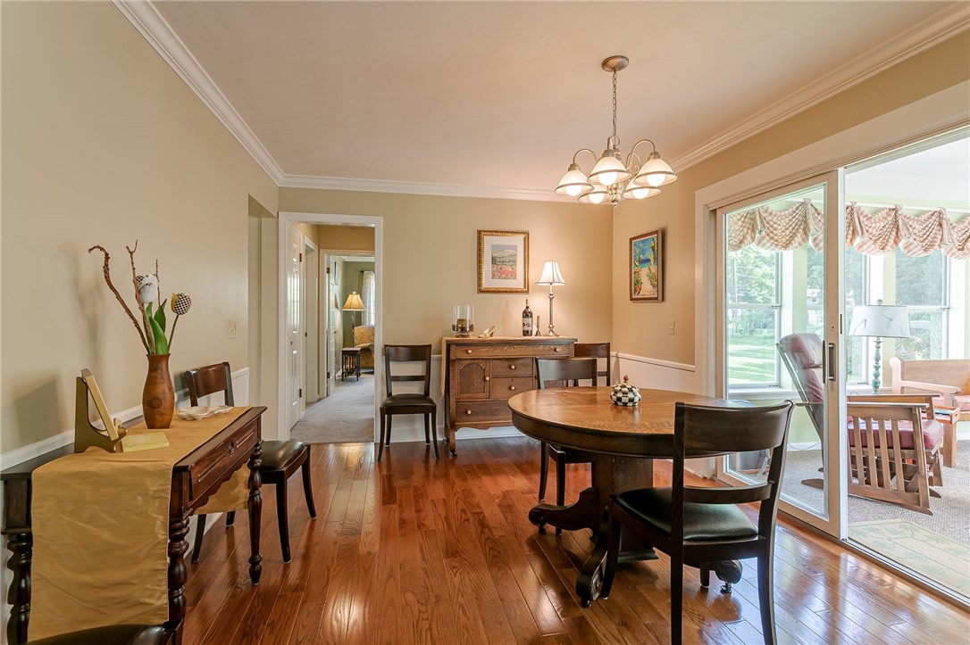 2024 Baird Road Penfield, NY 14526 - Photo 22 of 37 View from kitchen towards hallway leading to 1st f