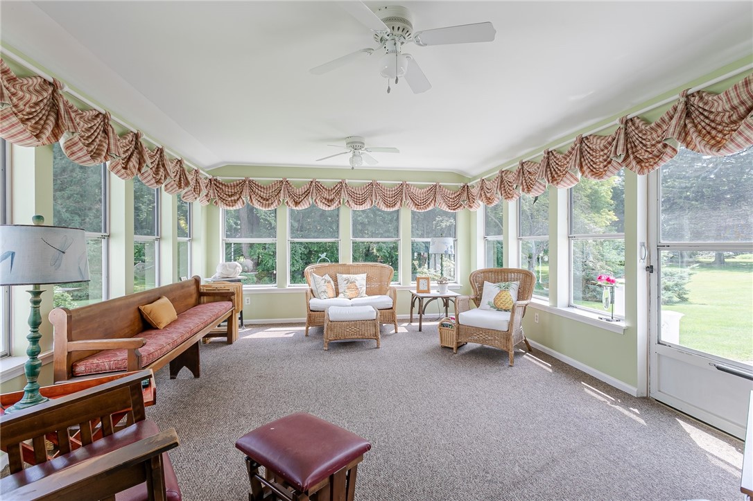 2024 Baird Road Penfield, NY 14526 - Photo 23 of 37 Admire local wildlife from this gorgeous sun room,