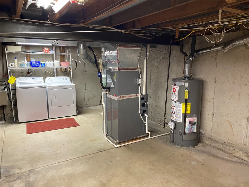 2024 Baird Road Penfield, NY 14526 - Photo 25 of 37 Furnace 3 years old; water tank 4 years old. Wash