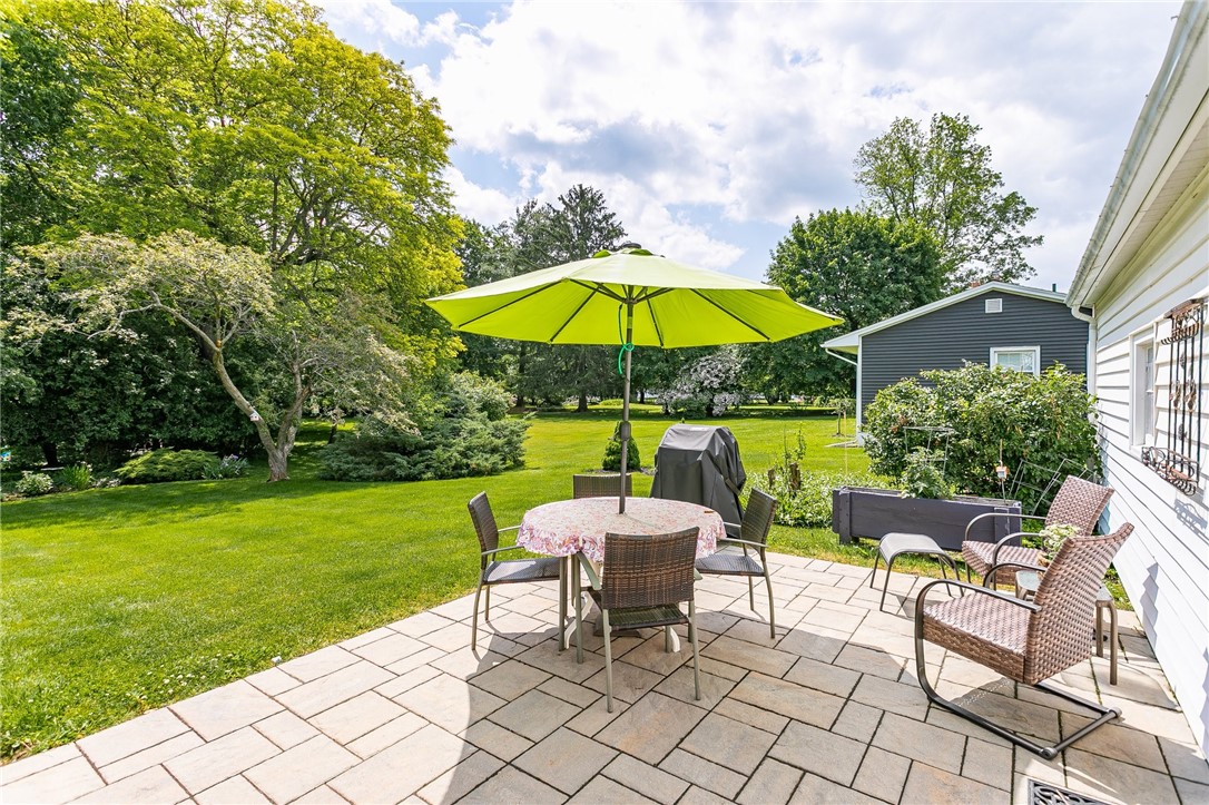 2024 Baird Road Penfield, NY 14526 - Photo 27 of 37 Another view of patio.