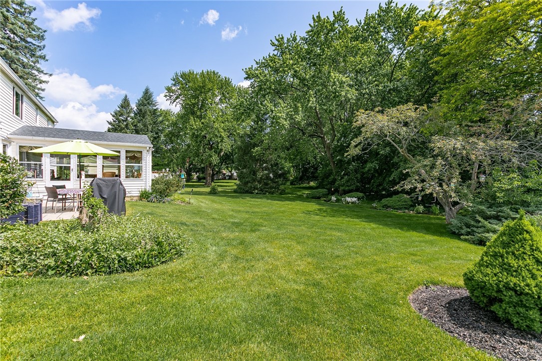 2024 Baird Road Penfield, NY 14526 - Photo 34 of 37 View of side gardens.