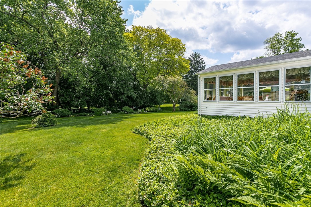 2024 Baird Road Penfield, NY 14526 - Photo 35 of 37 Ground cover on north side of sunroom.