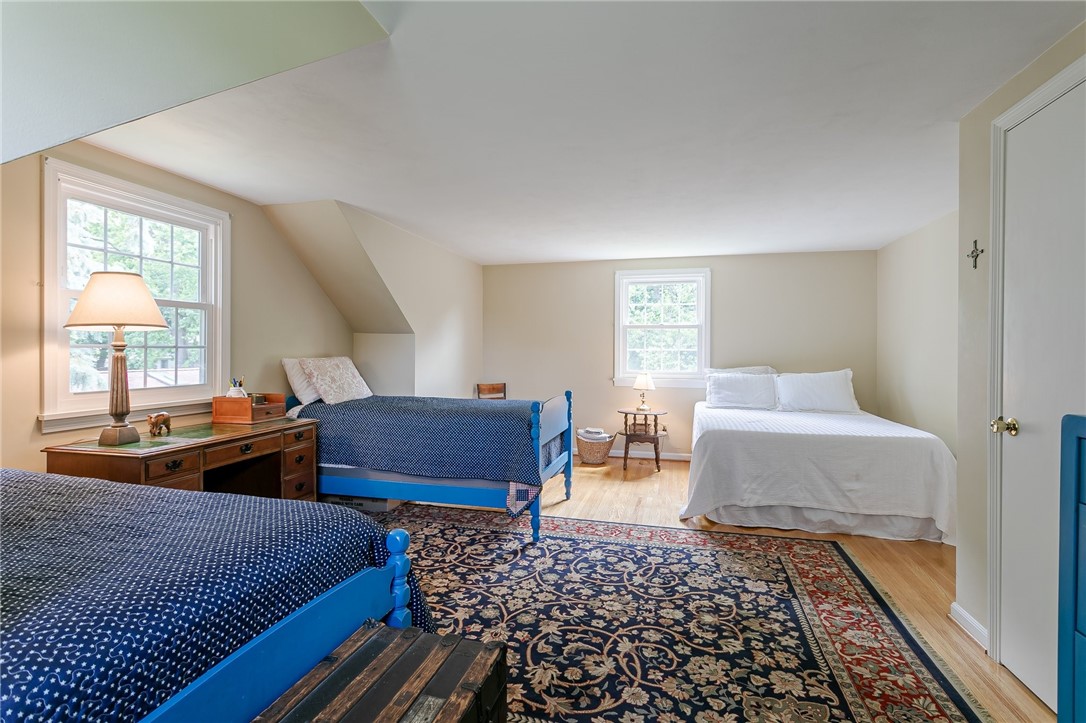 2024 Baird Road Penfield, NY 14526 - Photo 5 of 37 2nd upstairs bedroom is large enough for a slumber