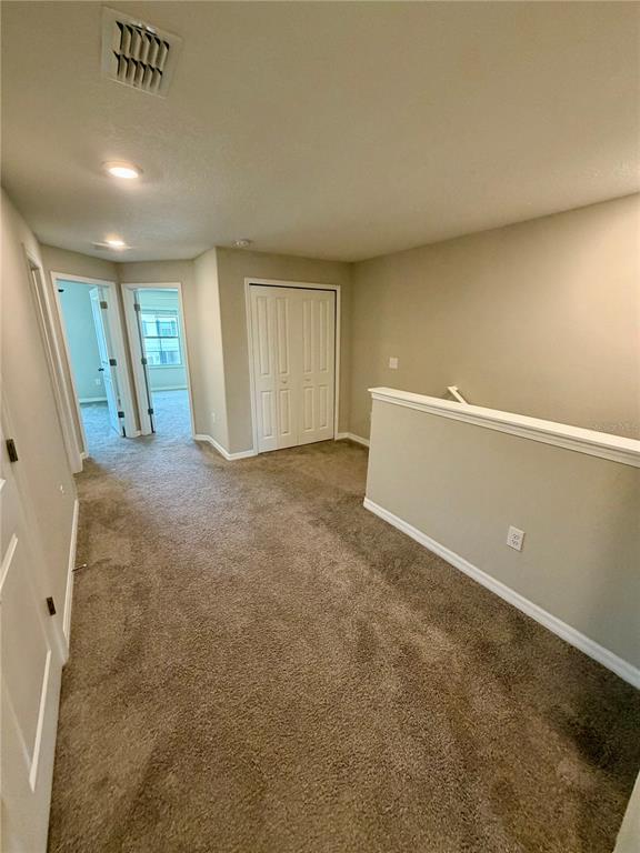 11826 Dumaine Valley Road Riverview, FL 33579 - Photo 21 of 54 a view of an empty room with a window