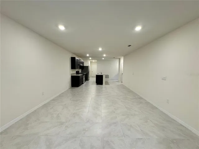 a view of a big room with an empty space