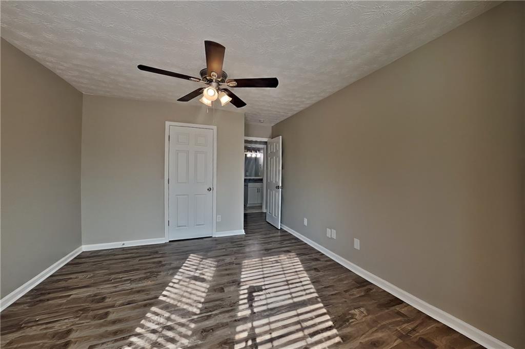 3845 Rajean Drive Lawrenceville, GA 30044 - Photo 13 of 18 a view of empty room with wooden floor