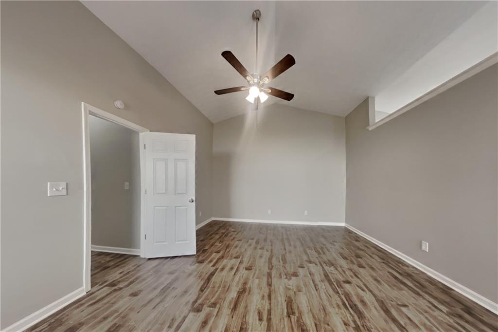 3845 Rajean Drive Lawrenceville, GA 30044 - Photo 9 of 18 a view of an empty room with wooden floor