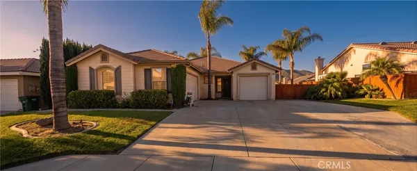 a front view of a house with yard