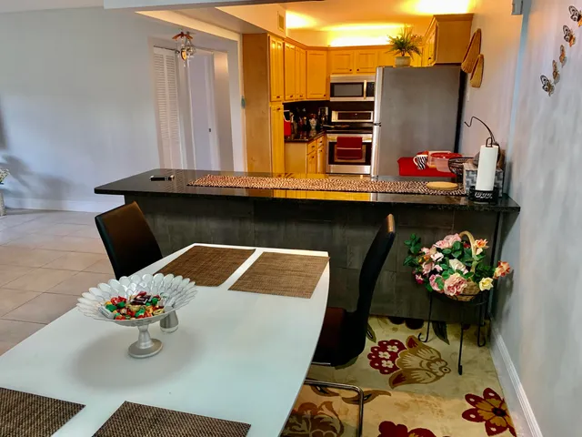 a kitchen with a sink and a stove