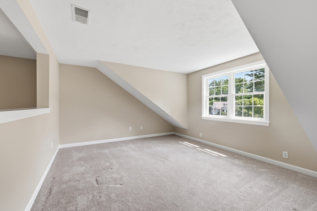 9 Rock Marsh Road, Unit B Wareham, MA 02571 - Photo 32 of 41 an empty room with windows