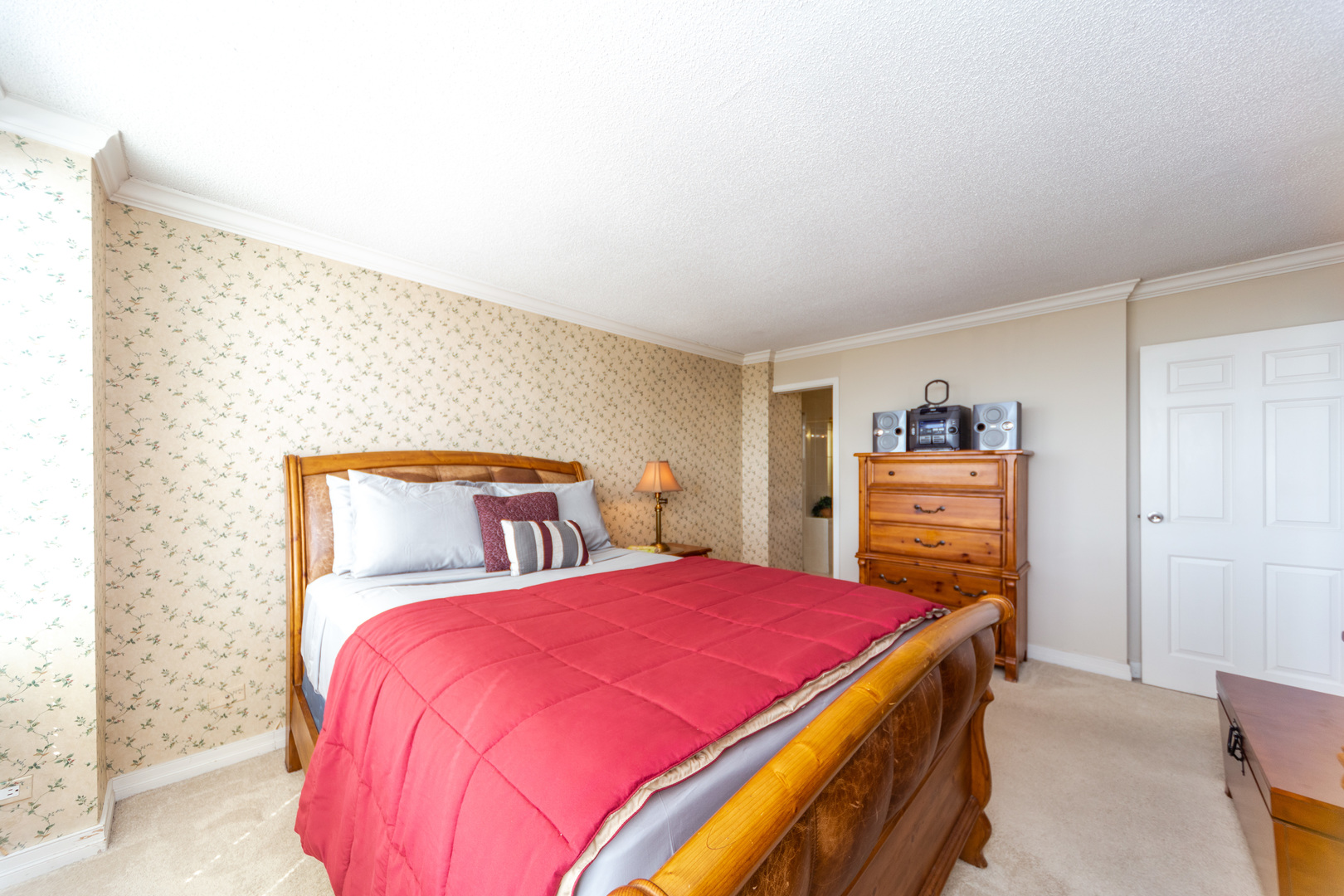 5320 North Sheridan Road, Unit 802 Chicago, IL 60640 - Photo 12 of 26 a bedroom with a bed and a closet