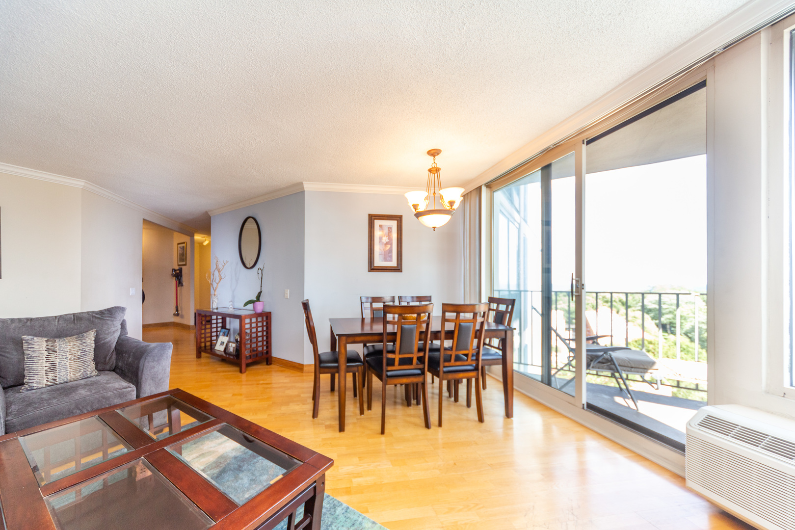 5320 North Sheridan Road, Unit 802 Chicago, IL 60640 - Photo 6 of 26 a living room with furniture and a large window