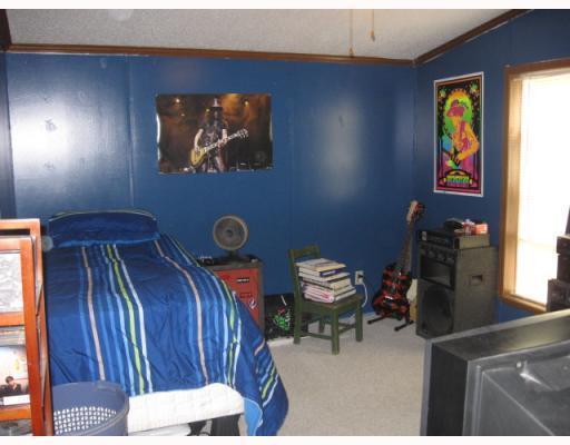 210 Mountain Road Raymond, ME 04071 - Photo 13 of 14 Bedroom. Former colors in rock-star...